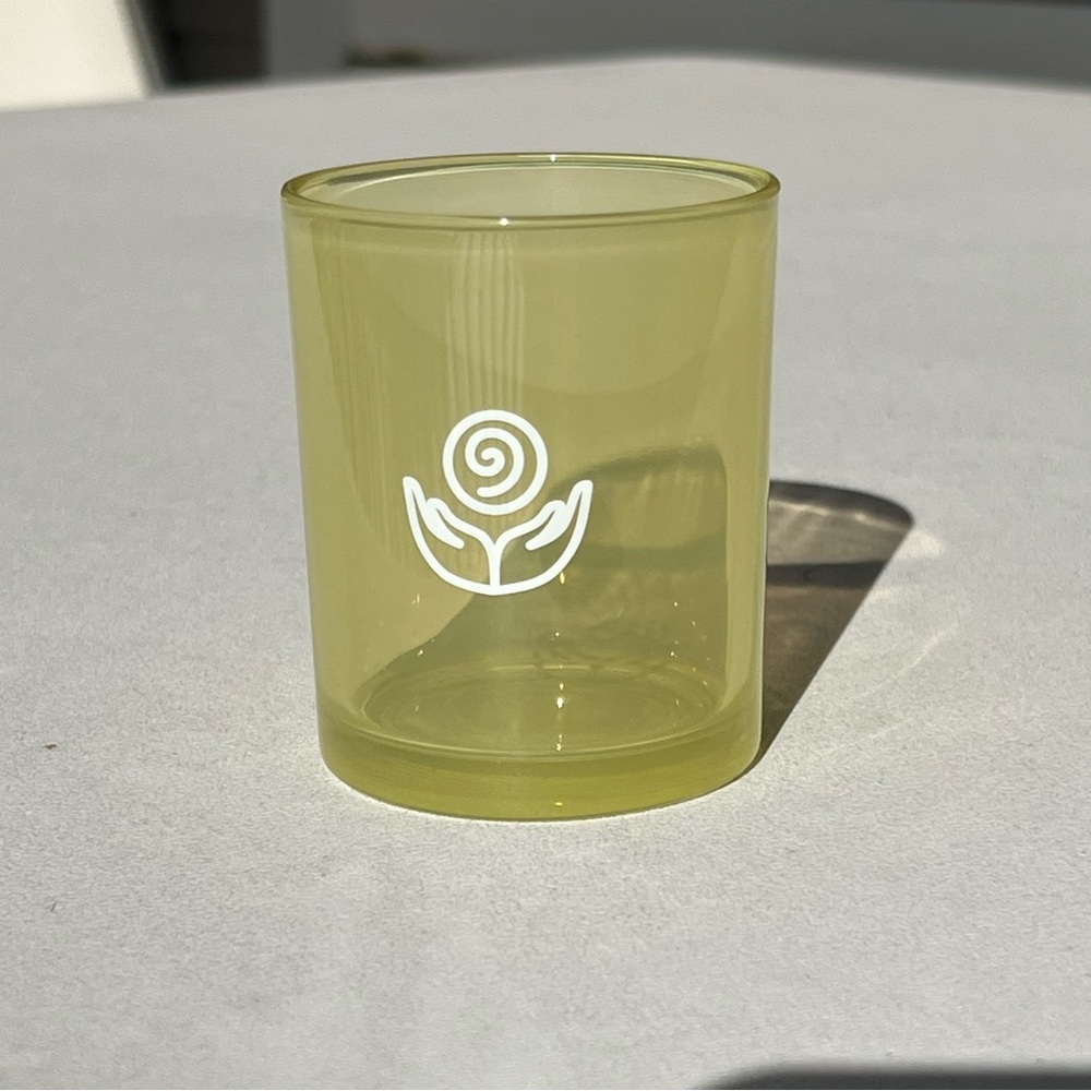 Elegant Yellow Glass Votive with Floral Motif candleholder